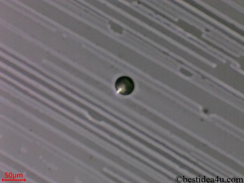 宇宙塵（光学顕微鏡250倍、偏射照明）直径30μmの球体